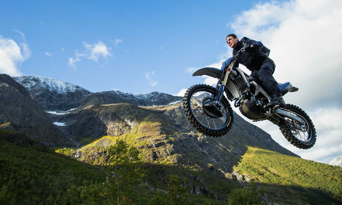 tom cruise airborne on a motorcycle in mission impossible 7: dead reckoning